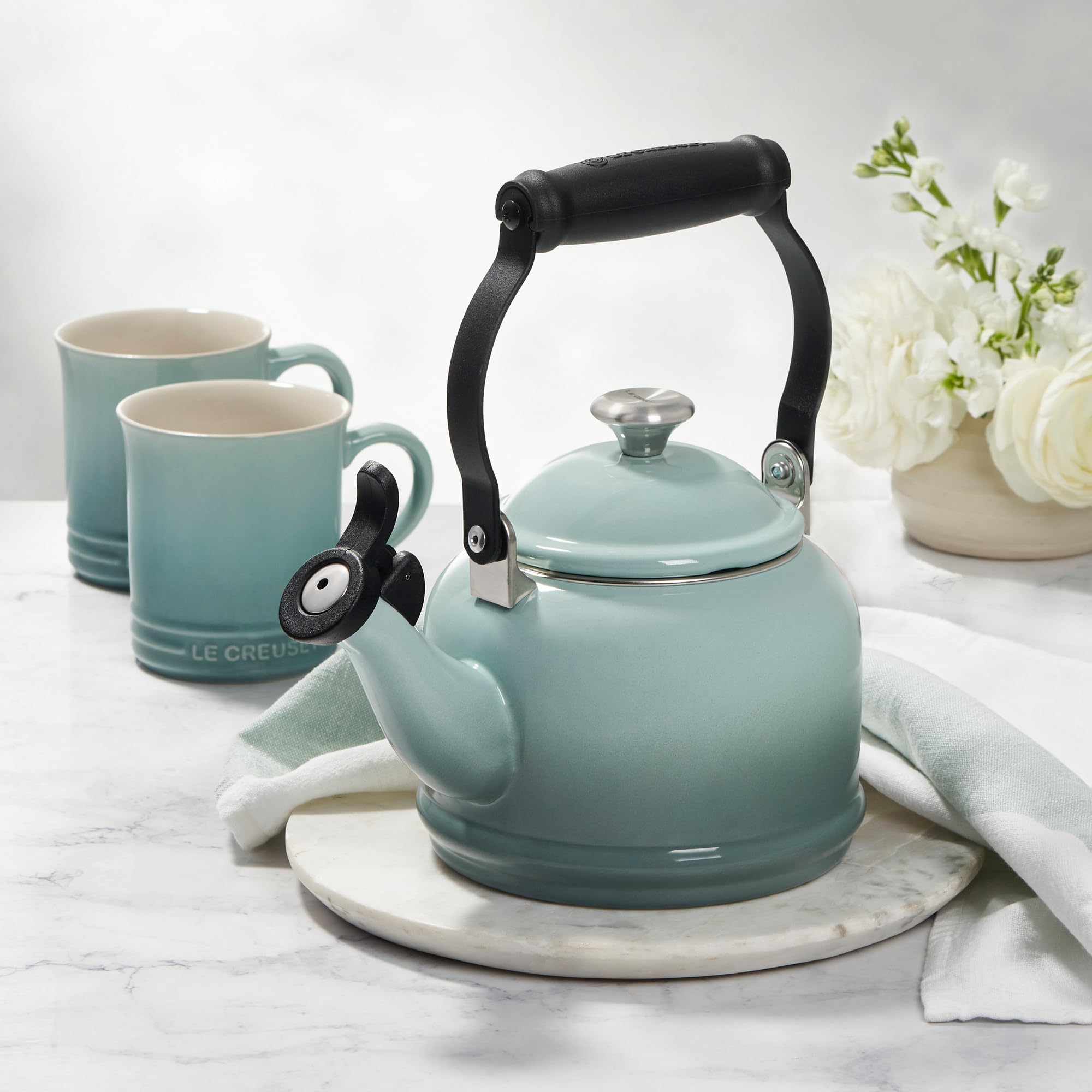 le-creuset-enamel-on-steel-demi-tea-kettle-with-metal-finishes-1-25-qt-olive image 5